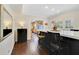 Elegant kitchen island with marble countertop and seating, connects to adjacent kitchen area at 640 S Lake Formosa Dr, Orlando, FL 32803