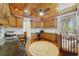 Home office featuring wood paneled ceiling, custom cabinets, and a built-in desk at 640 S Lake Formosa Dr, Orlando, FL 32803
