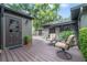 Inviting patio with comfortable seating, lush landscaping, and access to the home at 640 S Lake Formosa Dr, Orlando, FL 32803