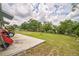 View of a spacious backyard, ideal for gardening or outdoor activities at 6401 Fortune Ln, Apopka, FL 32712