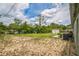 View of a spacious backyard, ideal for gardening or outdoor activities at 6401 Fortune Ln, Apopka, FL 32712