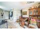 View of dining room with table, hutch and doorway to another room at 6401 Fortune Ln, Apopka, FL 32712