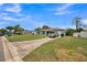 A charming one-story home, featuring an attached one-car garage and spacious front yard at 6401 Fortune Ln, Apopka, FL 32712