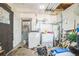 Utility room with washer, dryer, and ample storage space for laundry essentials at 6401 Fortune Ln, Apopka, FL 32712