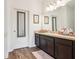 Bathroom with a vanity and door mirror at 785 Orchid Grove Blvd, Davenport, FL 33837