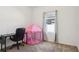This bedroom includes a desk, black chair, play tent and large window at 785 Orchid Grove Blvd, Davenport, FL 33837
