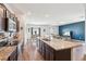 Modern kitchen with stainless steel appliances and dark wood cabinetry at 785 Orchid Grove Blvd, Davenport, FL 33837