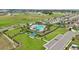 Beautiful aerial view of the community pool, playground, and amenities at 785 Orchid Grove Blvd, Davenport, FL 33837
