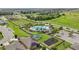 Aerial view of the community pool and playground, great for families at 785 Orchid Grove Blvd, Davenport, FL 33837