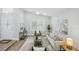 Open-concept living room featuring a contemporary design with a neutral palette and ample natural light at 841 Wesson Ct, Casselberry, FL 32707