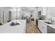 Open concept living space with modern kitchen, dining area, and a comfortable living room, perfect for Gathering gatherings at 841 Wesson Ct, Casselberry, FL 32707