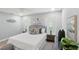 Comfortable main bedroom with accent pillows, a ceiling fan, and dual windows for natural light at 841 Wesson Ct, Casselberry, FL 32707