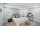 Comfortable main bedroom with accent pillows, a ceiling fan, and dual windows for natural light at 841 Wesson Ct, Casselberry, FL 32707