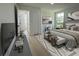 Comfortable bedroom with great natural light, closet and stylish decor at 910 Flamingo Dr, Leesburg, FL 34748