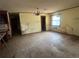 Dining room with tiled floors featuring a chandelier fixture ready to be revitalized at 4250 Lake Ave, Kissimmee, FL 34746
