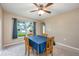 Cozy dining room with natural light and seating for four at 100 Monterey Oaks Dr, Sanford, FL 32771