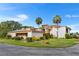Charming condo featuring manicured landscaping, lush greenery, and a serene, picturesque setting at 1051 S Highland St # 7D, Mount Dora, FL 32757