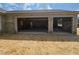View of a spacious, unfinished three-car garage, ready for customization and ample storage at 12258 Sw 76 Ln, Dunnellon, FL 34432