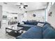 Spacious open concept living area featuring tile floors, recessed lighting, and easy access to the kitchen at 14460 Orchard Hills Blvd, Winter Garden, FL 34787