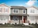 Charming townhome showcasing craftsman-style architecture and inviting front porch at 148 Royal Ranch Rd, Clermont, FL 34715