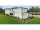 Aerial view of a modern home featuring a pool, outdoor kitchen, and manicured landscaping in backyard at 1733 Harmon Ave, Winter Park, FL 32789