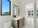 Stylish bathroom features modern fixtures, sleek vanity, and contemporary design with a calming aesthetic at 1733 Harmon Ave, Winter Park, FL 32789