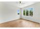 Bright bedroom with large windows that fill the room with natural light at 1733 Harmon Ave, Winter Park, FL 32789
