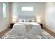 Clean bedroom with a modern bed frame, hardwood floors, and ample natural light at 1733 Harmon Ave, Winter Park, FL 32789