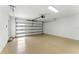 Spacious garage with painted floor and automatic door at 1733 Harmon Ave, Winter Park, FL 32789