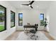 Bright office with large windows and modern desk and chair at 1733 Harmon Ave, Winter Park, FL 32789
