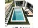 Overhead view of a backyard pool, outdoor lounge area, and modern home at 1733 Harmon Ave, Winter Park, FL 32789