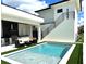 Beautiful backyard pool with outdoor kitchen and second story access at 1733 Harmon Ave, Winter Park, FL 32789
