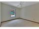 Bright bedroom with a window overlooking the pool and patio area at 1879 Odham Dr, Deltona, FL 32738