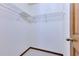 Small closet space with wire shelving and tile flooring at 1879 Odham Dr, Deltona, FL 32738