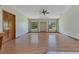 Spacious living room featuring gleaming hardwood floors and natural light at 1879 Odham Dr, Deltona, FL 32738