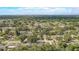 An aerial view shows the landscape of the residential area and its close proximity to local amenities at 1921 Heathwood Dr, Winter Park, FL 32792