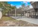 This expansive backyard features a screened pool and patio area, ideal for Gathering fun and outdoor relaxation at 1921 Heathwood Dr, Winter Park, FL 32792