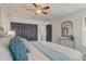 Bedroom featuring stylish closet doors and neutral walls with a ceiling fan at 1921 Heathwood Dr, Winter Park, FL 32792