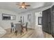 Dining area featuring hardwood flooring, lots of natural light, and an open concept at 1921 Heathwood Dr, Winter Park, FL 32792