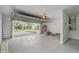 Large garage with an open door showing the driveway and neighborhood at 1921 Heathwood Dr, Winter Park, FL 32792