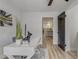 Bright office with desk and chair plus ensuite bathroom and open to the rest of the home at 1921 Heathwood Dr, Winter Park, FL 32792