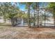 This beautiful screened in pool has mature plantings offering privacy and creating a tropical garden oasis at 1921 Heathwood Dr, Winter Park, FL 32792