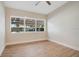 Bright bedroom with large windows, ceiling fan and view of the pool at 1926 Natalen Rd, Winter Park, FL 32792