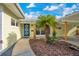 Charming front entrance showcasing a well-designed pathway leading to a vibrant blue front door at 1926 Natalen Rd, Winter Park, FL 32792