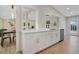 Bright open kitchen with ample countertop space, stainless steel appliances and abundant storage at 1926 Natalen Rd, Winter Park, FL 32792