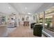 Bright living room with modern décor, light wood floors, and seamless transition to the outdoor space at 1926 Natalen Rd, Winter Park, FL 32792