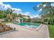In-ground pool, garden beds, poolside seating, and a storage shed in the backyard at 1926 Natalen Rd, Winter Park, FL 32792
