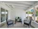 Screened porch features seating and outdoor access at 1926 Natalen Rd, Winter Park, FL 32792
