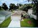 Aerial view of home showcasing a well-manicured lawn and a two-car garage at 2031 Wekiva Reserve Blvd, Apopka, FL 32703