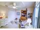 Spacious bedroom featuring a vaulted ceiling, fan, closet and other furniture at 2031 Wekiva Reserve Blvd, Apopka, FL 32703